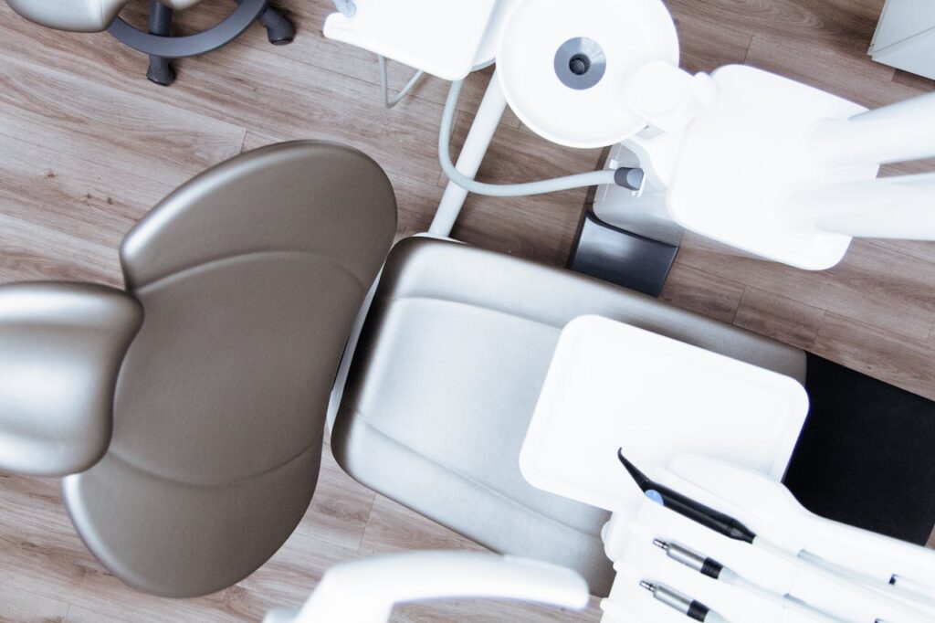 Dental chair and equipment in a modern dental practice setting, emphasizing patient care and comfort, reflecting Milkcan Marketing's focus on enhancing healthcare visibility.